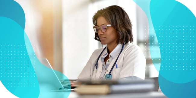 Doctor looking at a laptop screen, decorative image