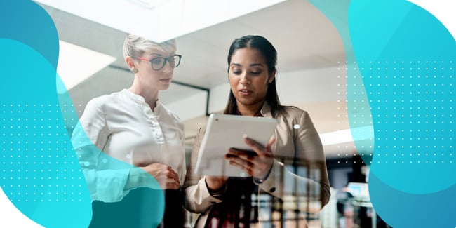 Two people looking at a tablet; decorative