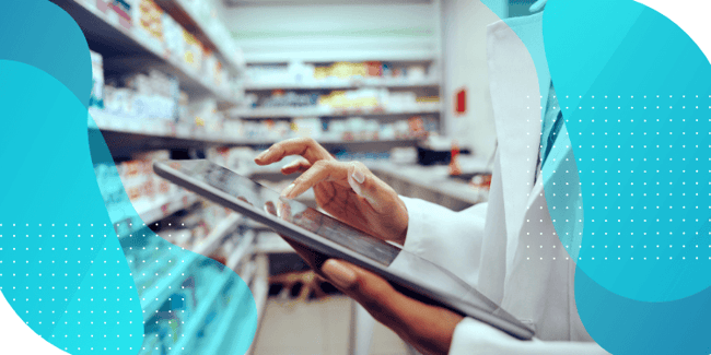 Pharmacist using a tablet to manage inventory in a pharmacy, representing the concept of a single source of truth for streamlined inventory management in healthcare settings.