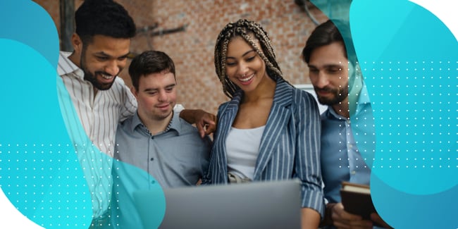 A diverse group of colleagues gather around a laptop, symbolizing collaboration in advancing diversity and accessibility in clinical trials. 