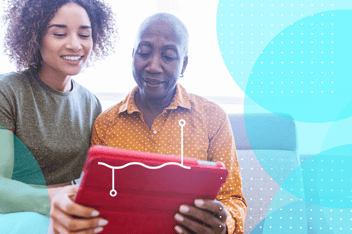 An image of a caregiver in oncology with a patient.