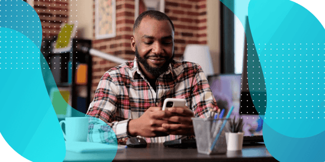 A male researching on a smartphone, focused on trial optimization in the context of decentralized methods.